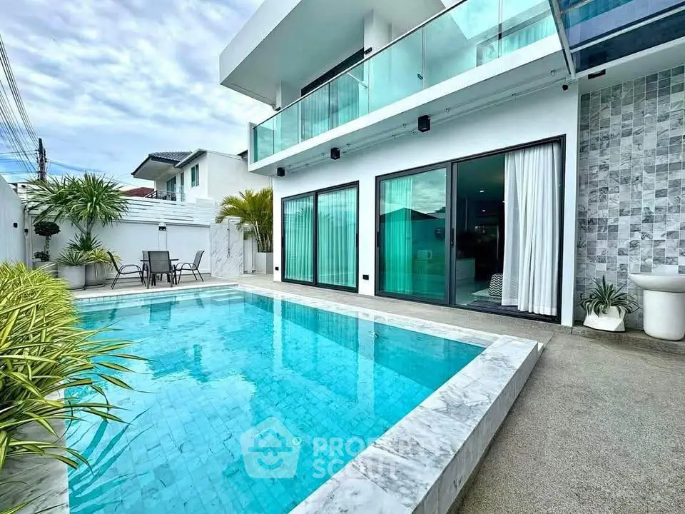 Luxurious modern villa with private pool and spacious balcony, perfect for relaxation and entertaining.