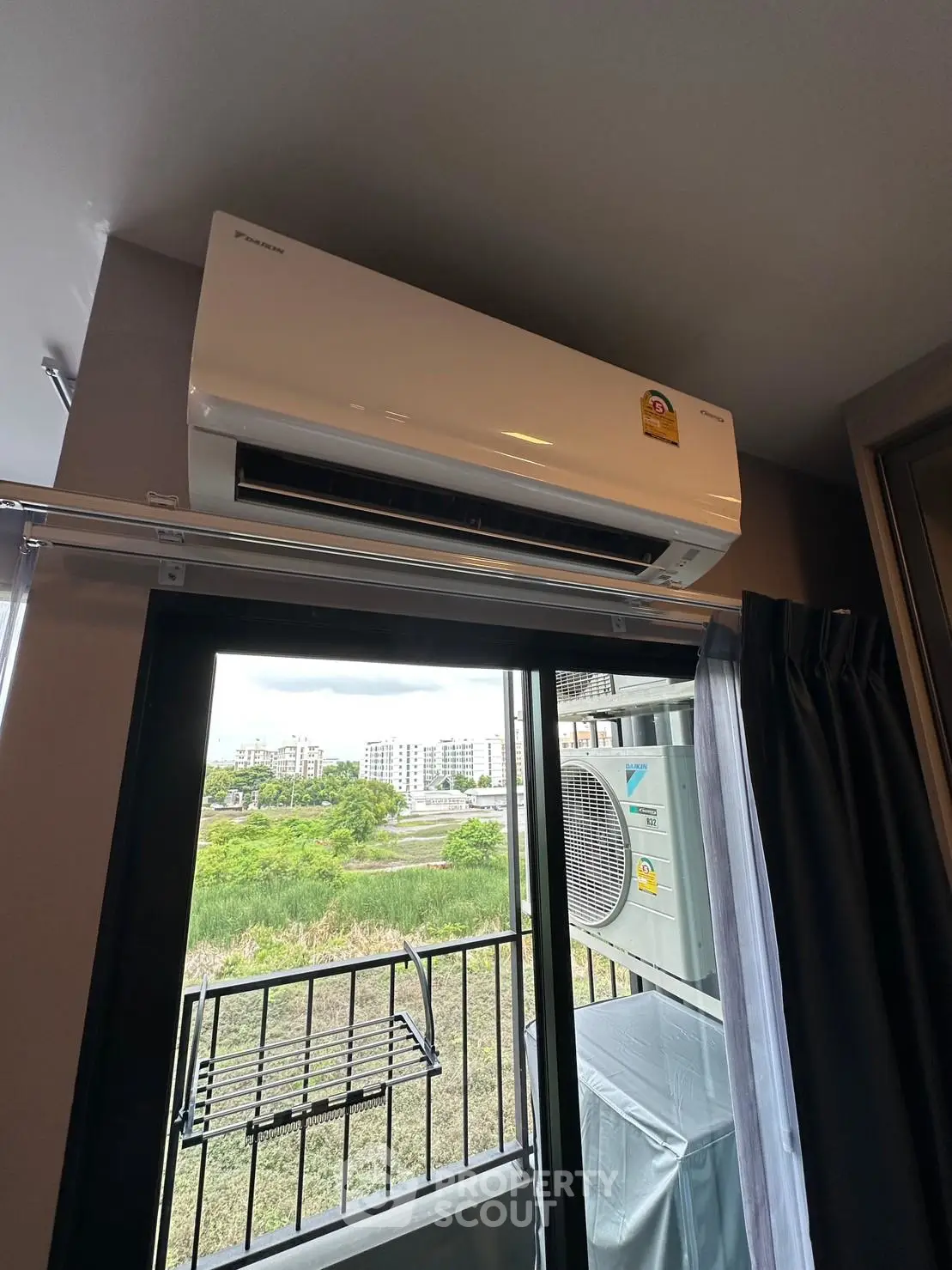 Modern apartment with air conditioning and balcony view