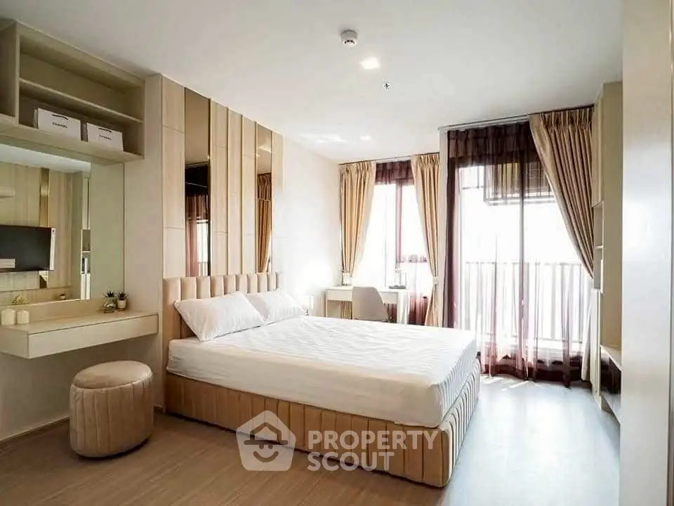 Spacious modern bedroom with elegant decor and natural light