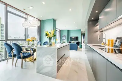 Luxurious open-plan kitchen and living area with modern design and stunning city views.