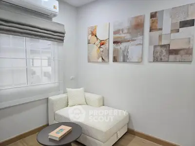 Modern living room with stylish decor and cozy seating area