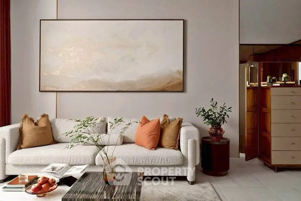 Elegant living room with modern sofa, stylish decor, and warm lighting for a cozy ambiance.