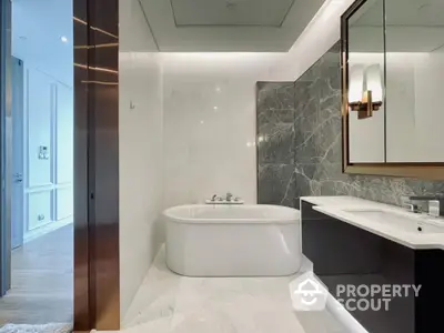 Luxurious modern bathroom with elegant marble finishes and sleek fixtures