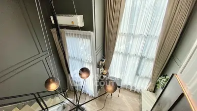 Stunning modern duplex with high ceilings and elegant lighting