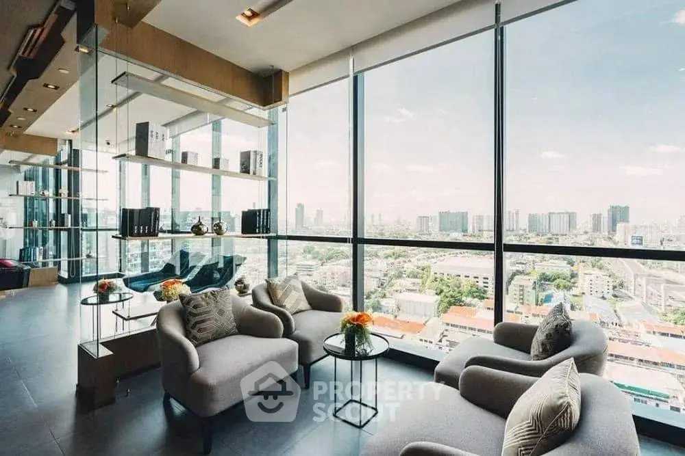 Luxurious high-rise living room with panoramic city views and modern decor.