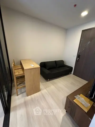 Cozy living room with modern furniture and wooden flooring