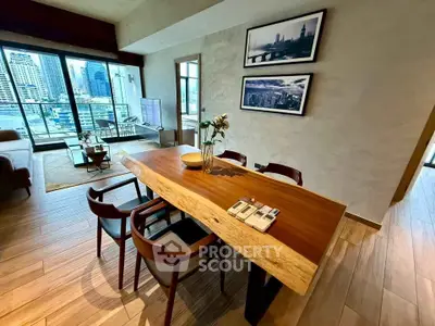 Luxurious dining area with wooden table and city view in modern apartment