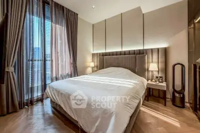 Luxurious bedroom with elegant decor and floor-to-ceiling windows