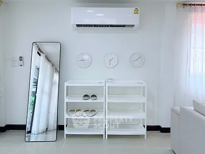 Modern living room with sleek air conditioning and minimalist decor