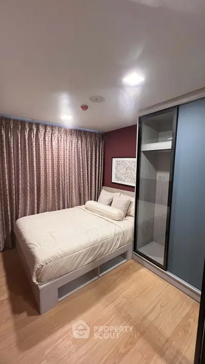Cozy bedroom with modern design and ample storage space