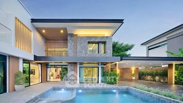 Luxurious modern home with stunning pool and elegant architectural design, perfect for upscale living.