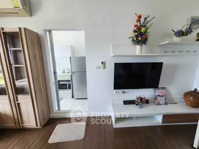 Modern living room with stylish decor and open kitchen view