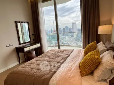 Luxurious bedroom with stunning city view and elegant decor