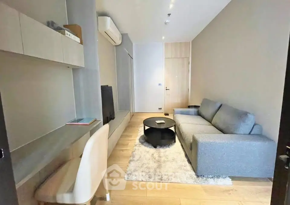 Modern living room with sleek furniture and cozy ambiance