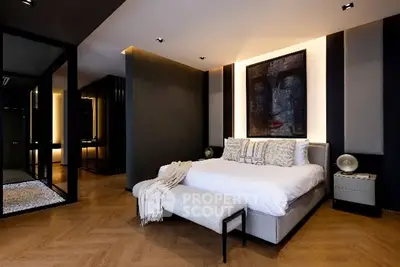 Luxurious modern bedroom with elegant decor and cozy ambiance