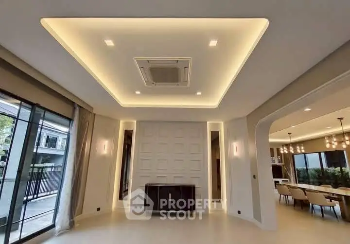 Luxurious modern living room with elegant lighting and spacious design