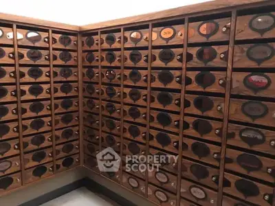 Elegant wooden mailboxes in a residential building lobby