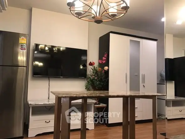 Modern living room with stylish furniture and elegant lighting