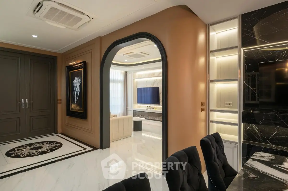 Luxurious modern living room with elegant decor and marble accents