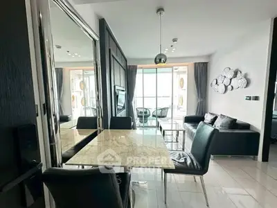 Modern living room with elegant dining area and stylish decor