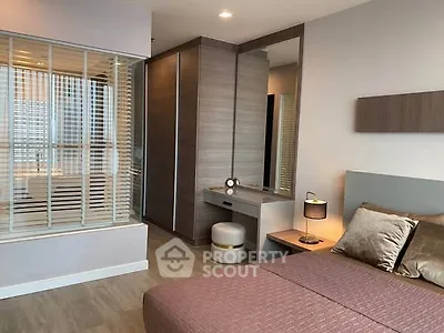 Modern bedroom with stylish decor and built-in wardrobe