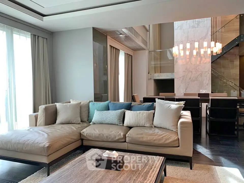 Luxurious modern living room with elegant decor and spacious seating area