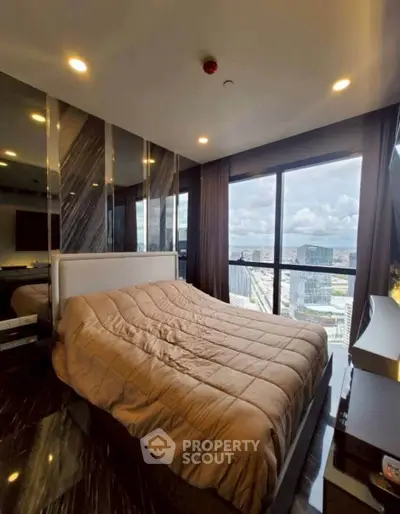 Luxurious bedroom with stunning city view and modern decor