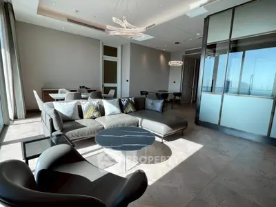 Luxurious modern living room with elegant decor and panoramic city view