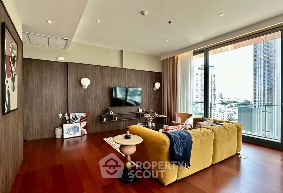 Spacious modern living room with city view and stylish decor