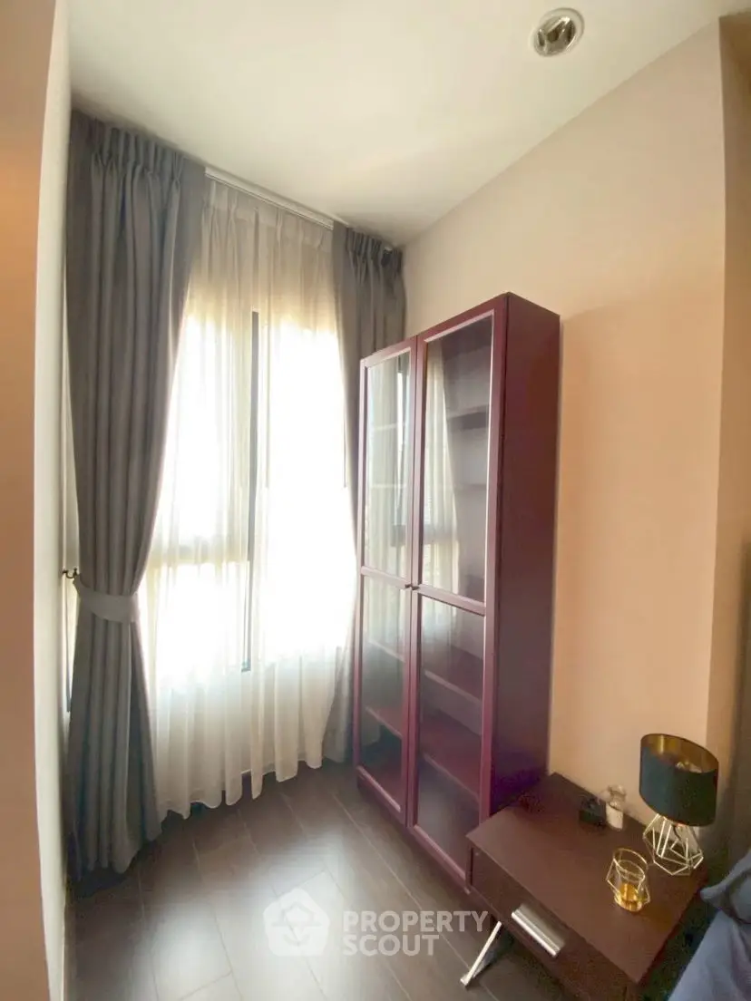Cozy study nook with natural light and elegant furnishings