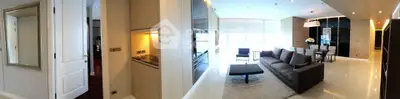 Luxurious modern living room with open layout and elegant decor