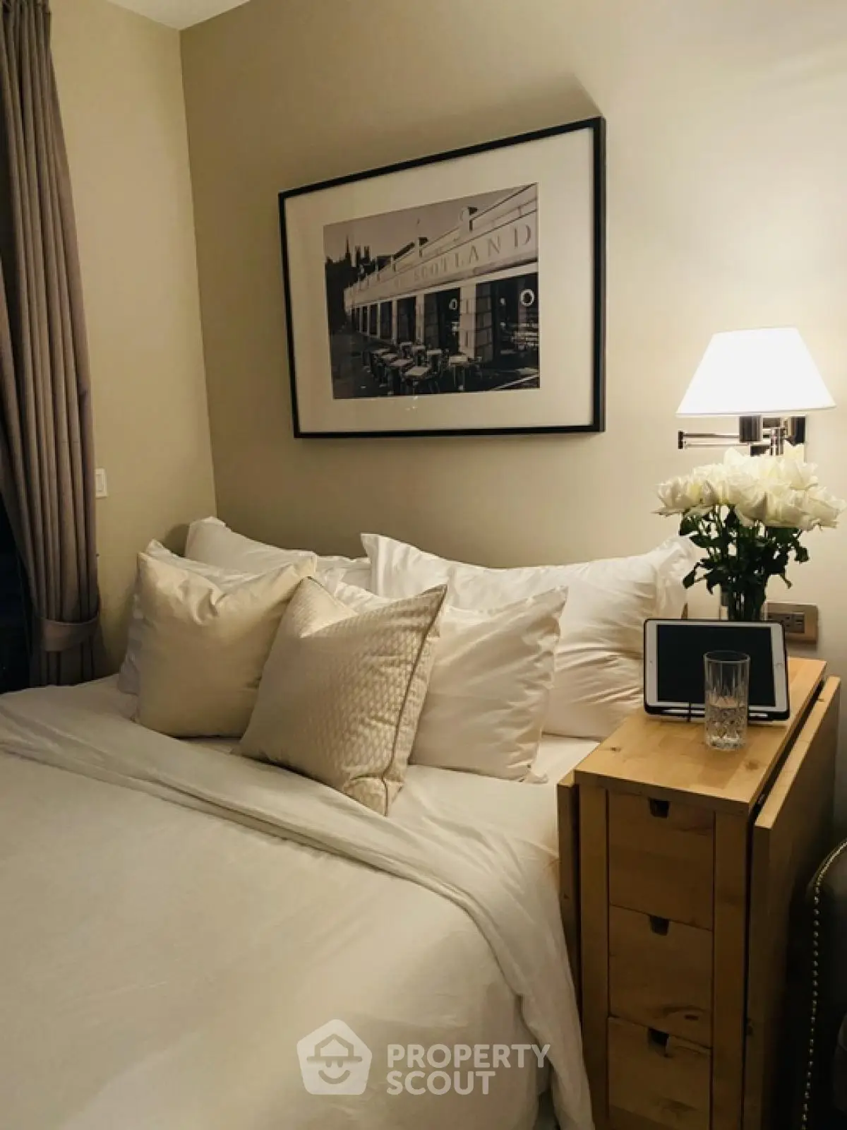 Cozy bedroom with elegant decor and soft lighting, perfect for relaxation.
