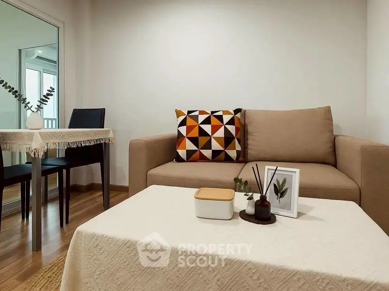 Cozy living room with modern decor and stylish furniture, perfect for relaxation and entertaining.