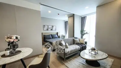 Modern studio apartment with elegant decor and cozy living area
