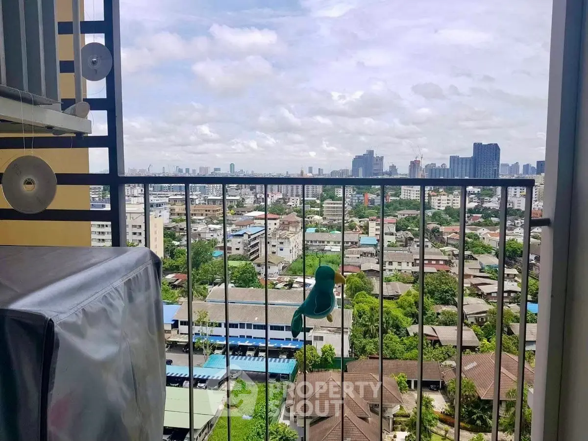 Stunning cityscape view from a high-rise balcony, perfect for urban living enthusiasts.