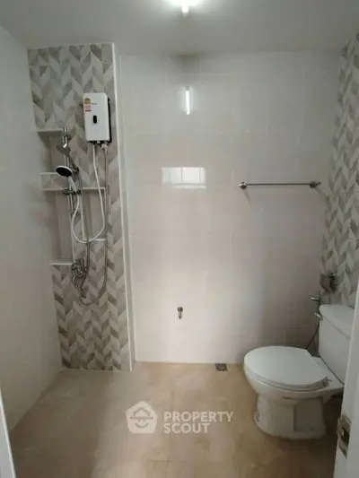 Modern bathroom with sleek tile design and shower area