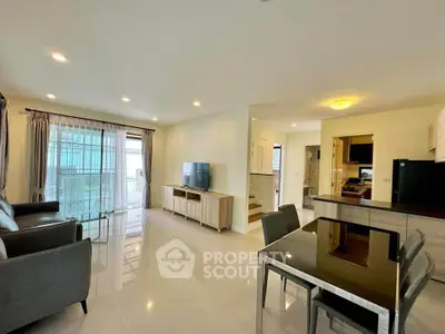 Spacious modern living room with open layout and sleek furniture
