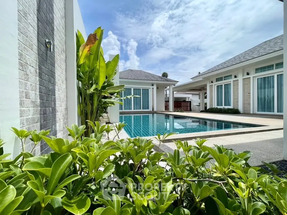 Luxurious villa with private pool and lush garden, perfect for serene living.