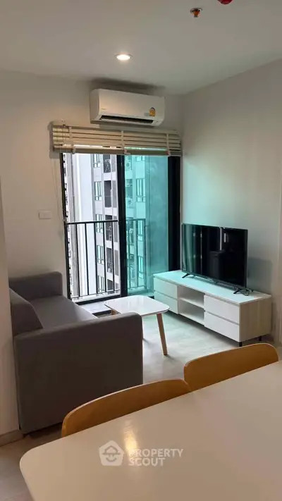 Modern living room with balcony view in a stylish apartment
