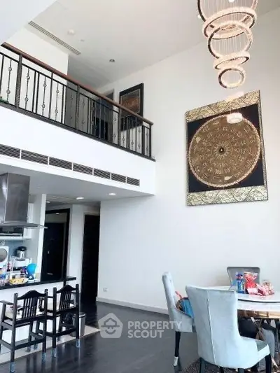 Luxurious duplex living room with high ceilings and elegant decor