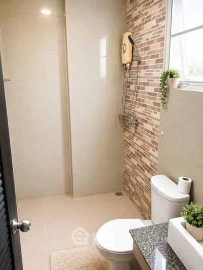 Modern bathroom with sleek shower and stylish tile design