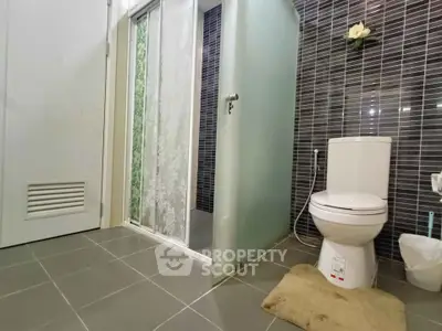 Modern bathroom with sleek design and glass shower door