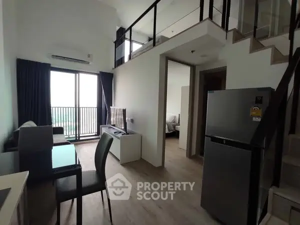 Modern loft apartment with open layout and balcony view