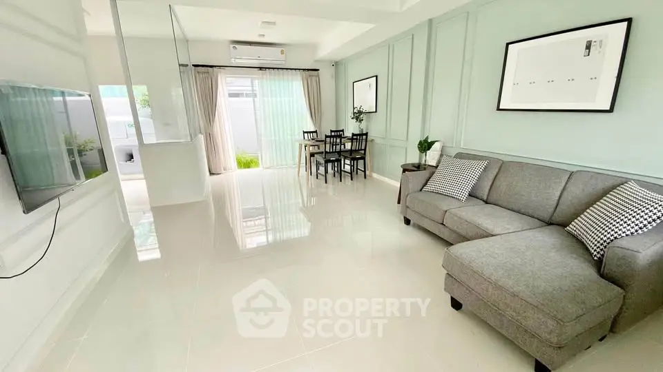 Spacious modern living room with elegant decor and natural light