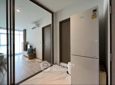 Modern apartment interior with sleek kitchen and spacious living area