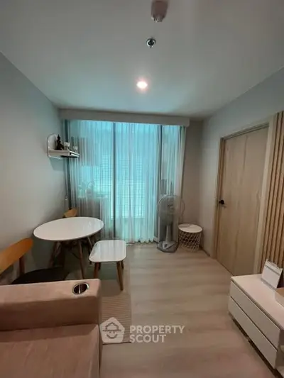 Cozy modern living room with natural light and minimalist decor