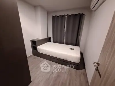 Modern bedroom with minimalist design and air conditioning