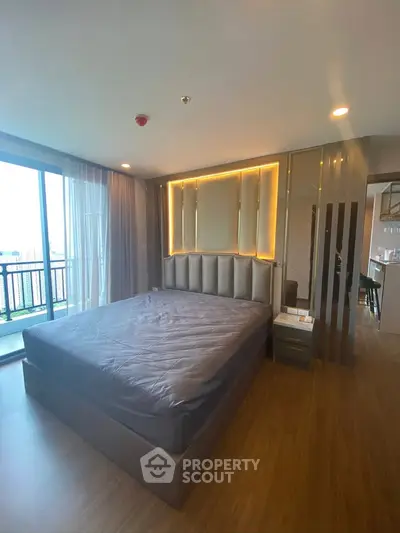 Luxurious modern bedroom with floor-to-ceiling windows and elegant lighting