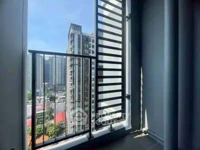 Modern balcony with city view in high-rise apartment building