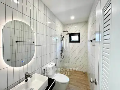 Modern bathroom with sleek fixtures and stylish tile design